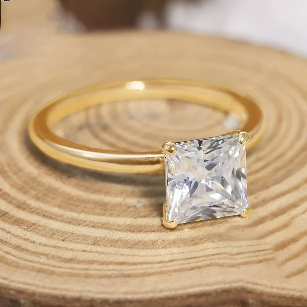 Simple geometric women's ring in 925 silver with a round zirconia stone, shown in silver, gold, and rose gold finishes.