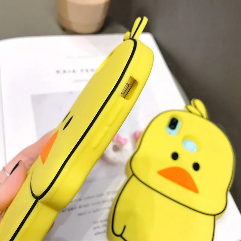 Green silicone phone case with a cartoon animal design for Apple iPhone models.