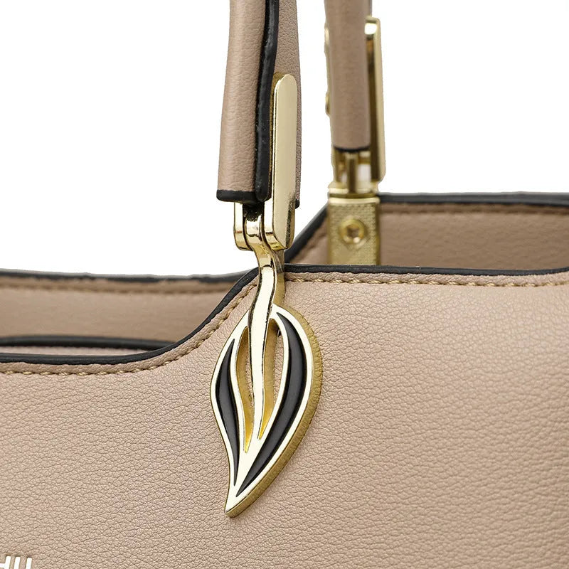Women's black PU messenger bag with multi-layer compartments and sewing thread detailing