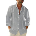 Men's polyester Cuban shirt in blue colour with button front and collar, shown on a model