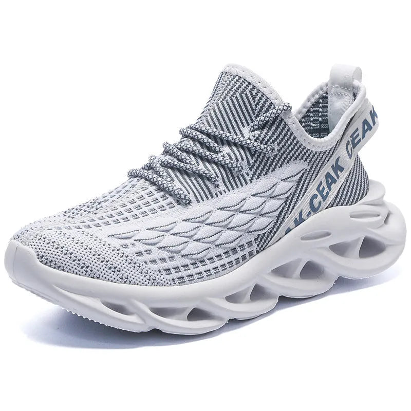 Blade mesh sports shoes in black with low-top design, lace-up closure, and breathable upper