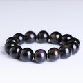 Natural crystal Pi Xiu bracelet with icy obsidian beads in geometric ethnic design