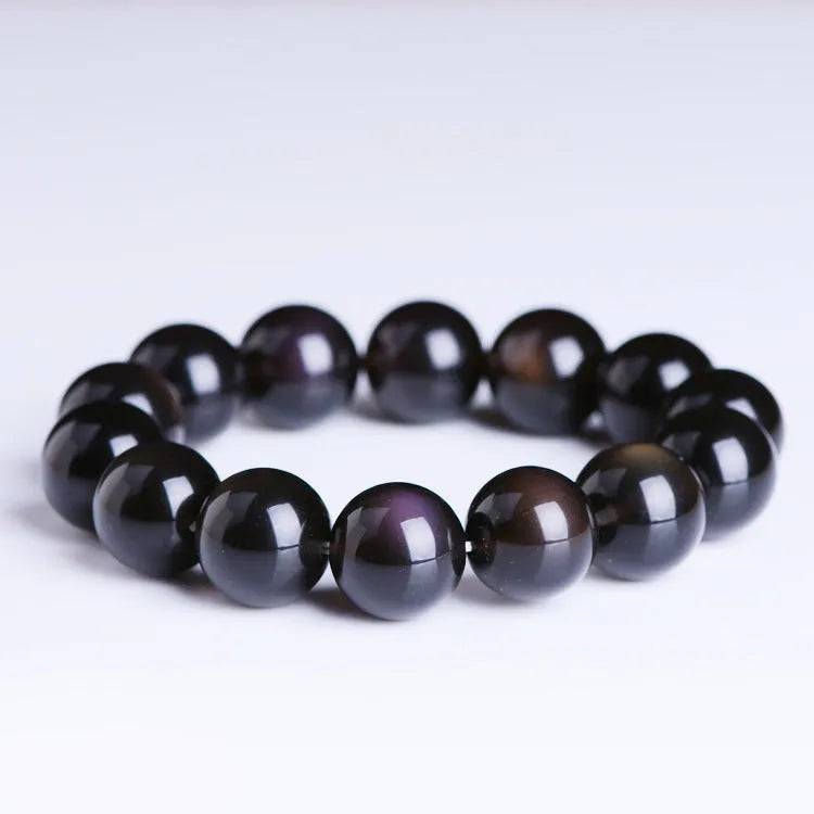 Natural crystal Pi Xiu bracelet with icy obsidian beads in geometric ethnic design