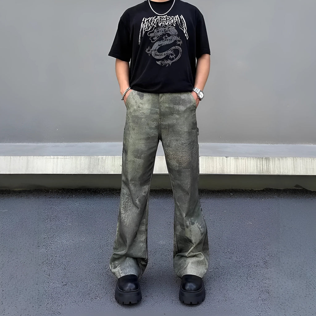 Man wearing retro digital camouflage print straight-leg jeans in cotton denim.