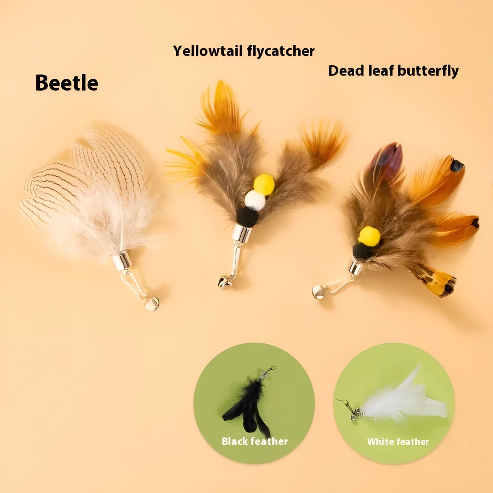 Three steel wire cat toys with small coloured flying insect heads on a table.