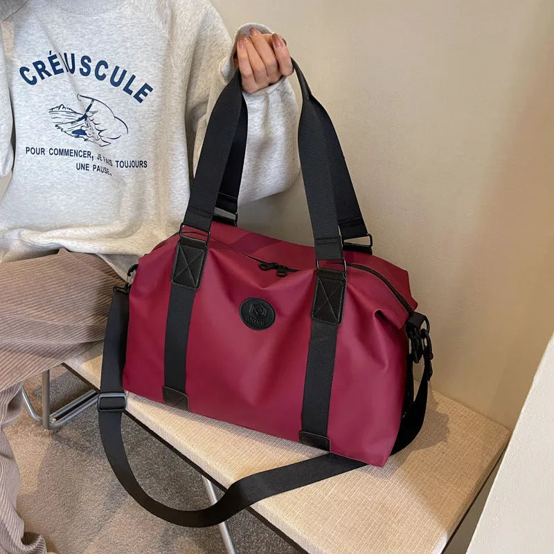 Large waterproof Oxford cloth travel bag in solid colour with 36-55L capacity for short-distance leisure travel