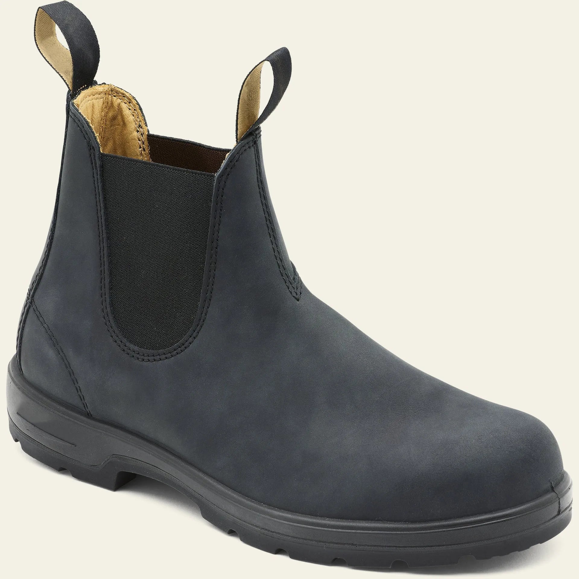 Vintage brown unisex Chelsea boot with frosted PU upper and round toe on a wooden surface.