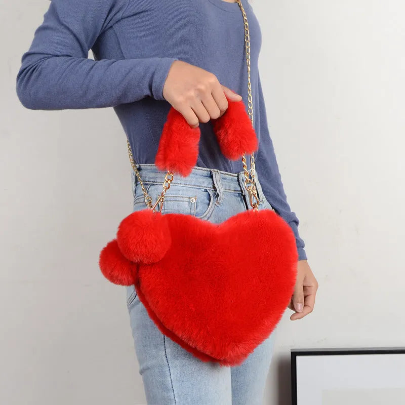 Heart-shaped women's plush handbag with soft texture and detachable shoulder strap in medium size