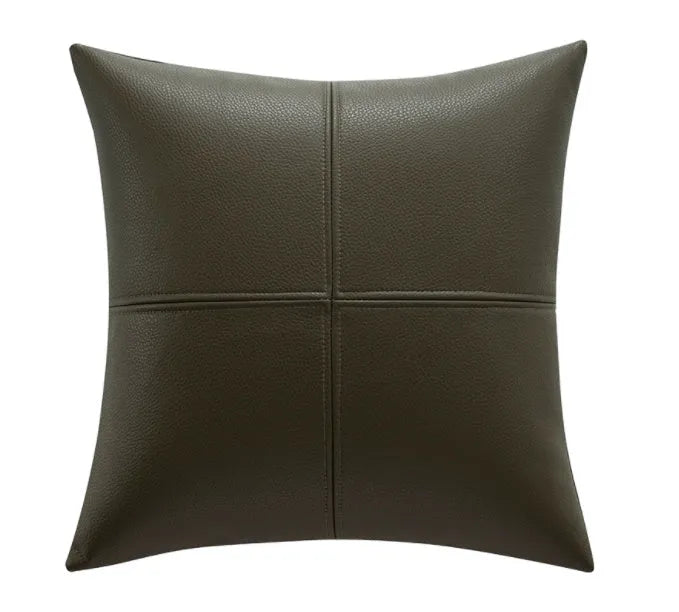 Solid colour soft cowhide leather pillow cover in Nordic style on a grey sofa.