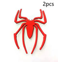 Three-dimensional metal spider bumper sticker in zinc alloy, showing detailed design