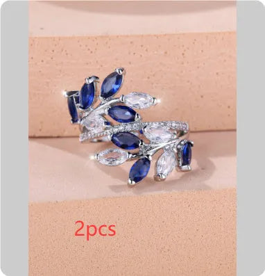 Adjustable copper leaf ring with a horse eye zircon stone in a choice of nine colour finishes.