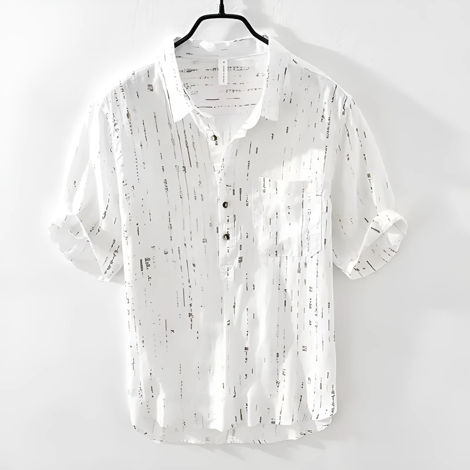 Men's black loose fit short-sleeved polo shirt showing cardigan style and thin fabric