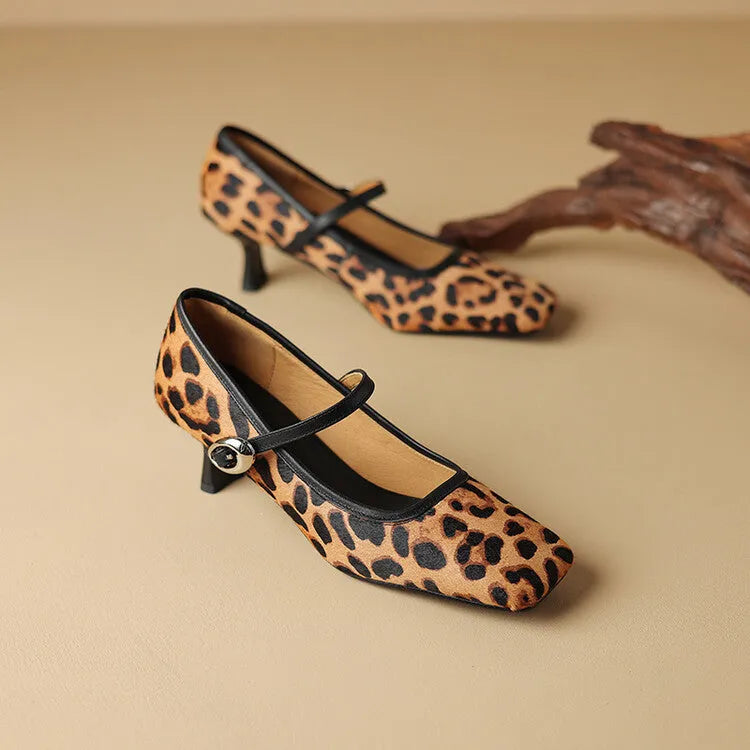 Women's black square toe stiletto ankle-strap heels with a horse hair upper.