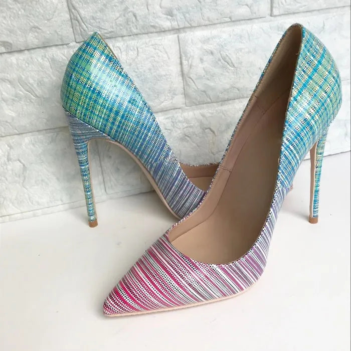 Pink and blue gradient women's high heel shoes with pointed toe and thin high heel on a plain background.