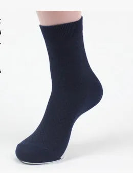 Men's bamboo fibre socks showing small square pattern in one of five available colours.