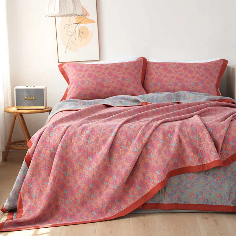 Cotton gauze three-piece bedding set with botanical plant and flower patterns including blanket and two pillowcases