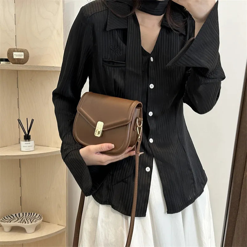 Soft PU leather clamshell messenger bag in horizontal square shape showing four colour options