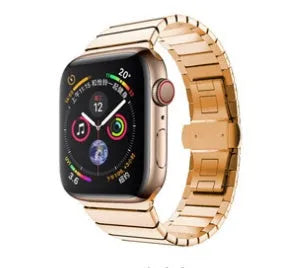 Silver stainless steel metal Apple Watch band with butterfly clasp on a 40mm watch case.