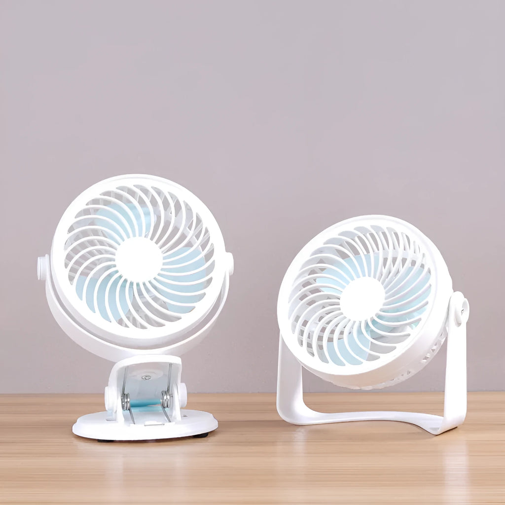White USB desk fan with clip attachment and three blades, shown on a desk.