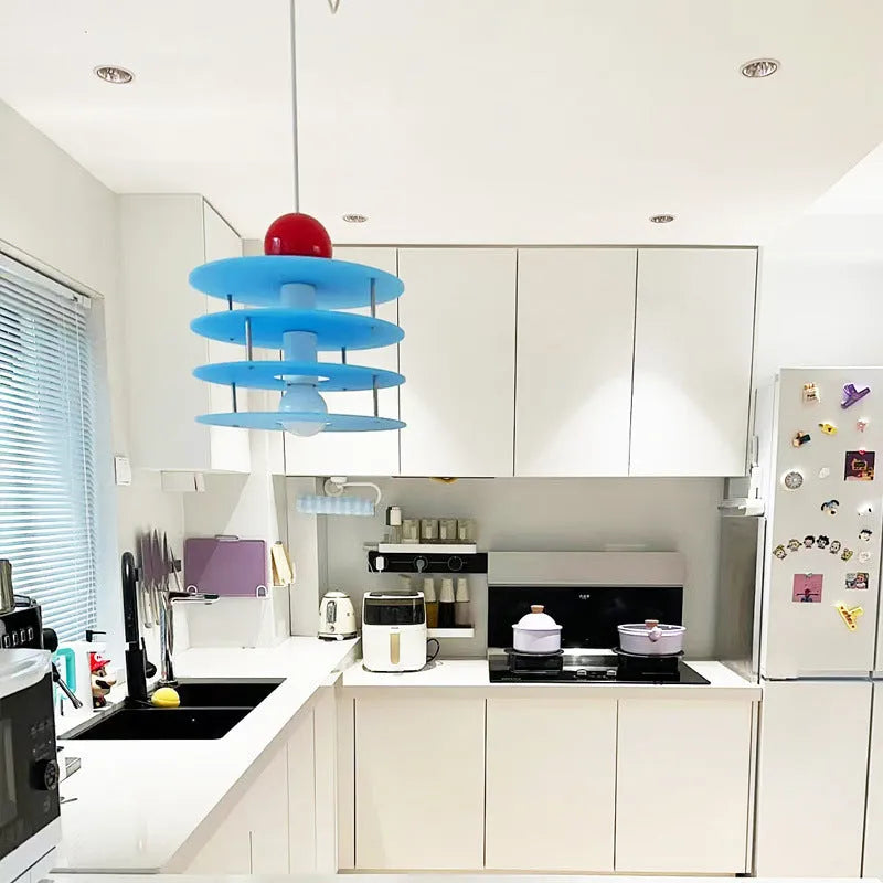 Personalised Macaron PH5 adjustable chandelier with frosted shade in restaurant setting
