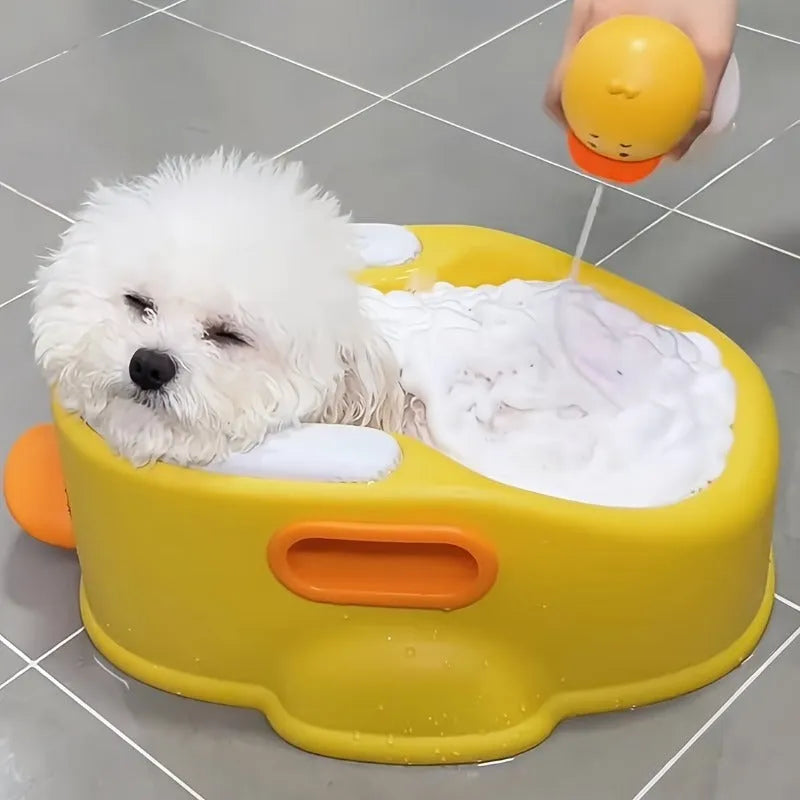 Blue duck-shaped PVC bathtub for washing dogs and cats on a plain background.