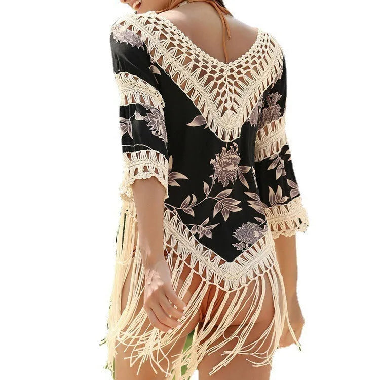 Women's apricot V-neck hollow-out sun protection shirt on a hanger.