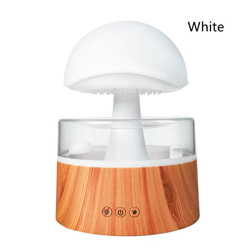 White rain cloud shaped ultrasonic humidifier and aroma diffuser with LED lighting showing rainfall simulation effect