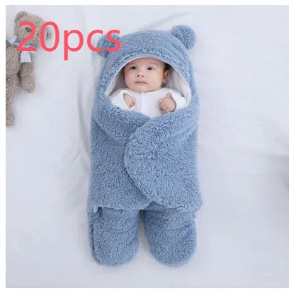Baby quilted sleeping bag wrapper in cotton blend fabric showing colour options: white, red, grey, light blue, pink, khaki.
