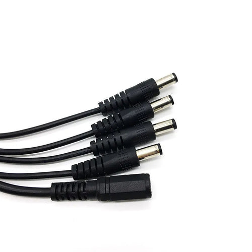 Black 12V DC 1-to-4 power splitter cable with five 5.5mm connectors for monitoring systems