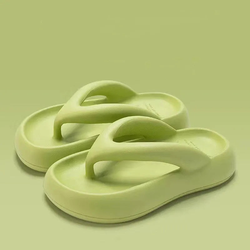 Women's thick-soled EVA flip-flops with a bow detail in assorted colours on a white background.