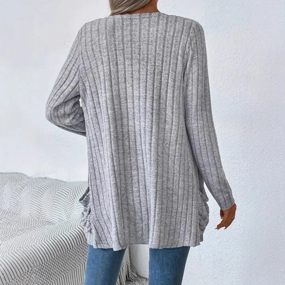 Long sleeve loose fit cardigan in solid colour with pockets, shown in black and granny grey.
