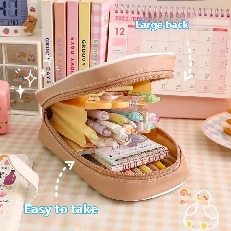 Large transparent PVC pencil case with cartoon bear, rabbit, and dog designs for student stationery.