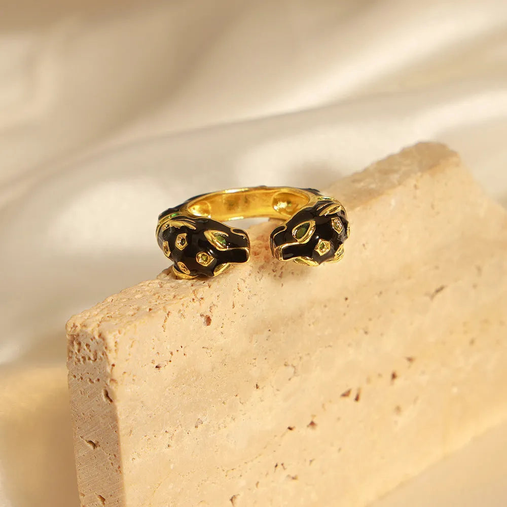 Black cheetah print geometric open ring for women in size 7, made from copper with electroplated finish