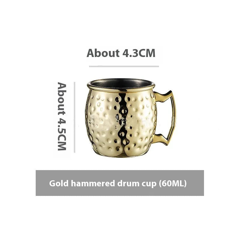 Copper plated stainless steel Moscow Mule mug in hammered and smooth styles, shown in silver, gold, rose gold, and black.