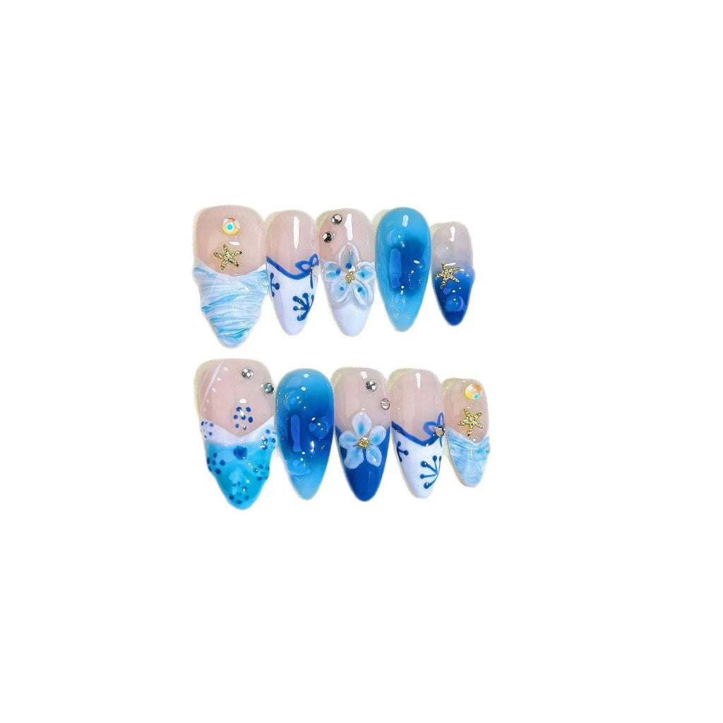 Blue hand-painted fake nails with carved transparent summer ice finish in four sizes