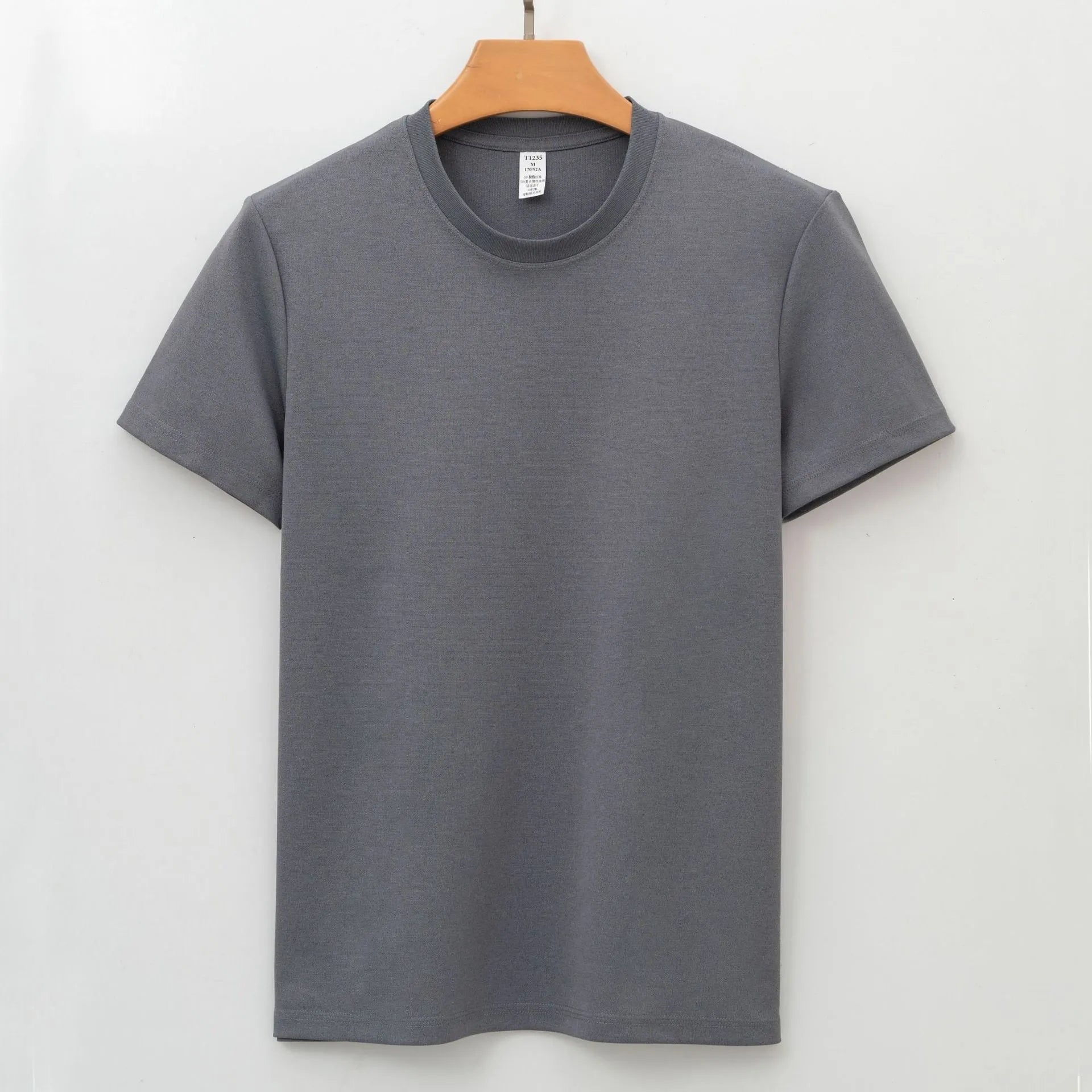 Men's beige short-sleeve antibacterial quick-dry T-shirt laid flat.
