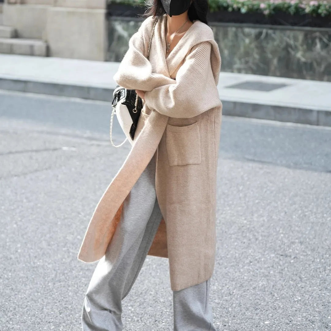 Long grey knitted cardigan with hood showing 80cm length and loose fit design