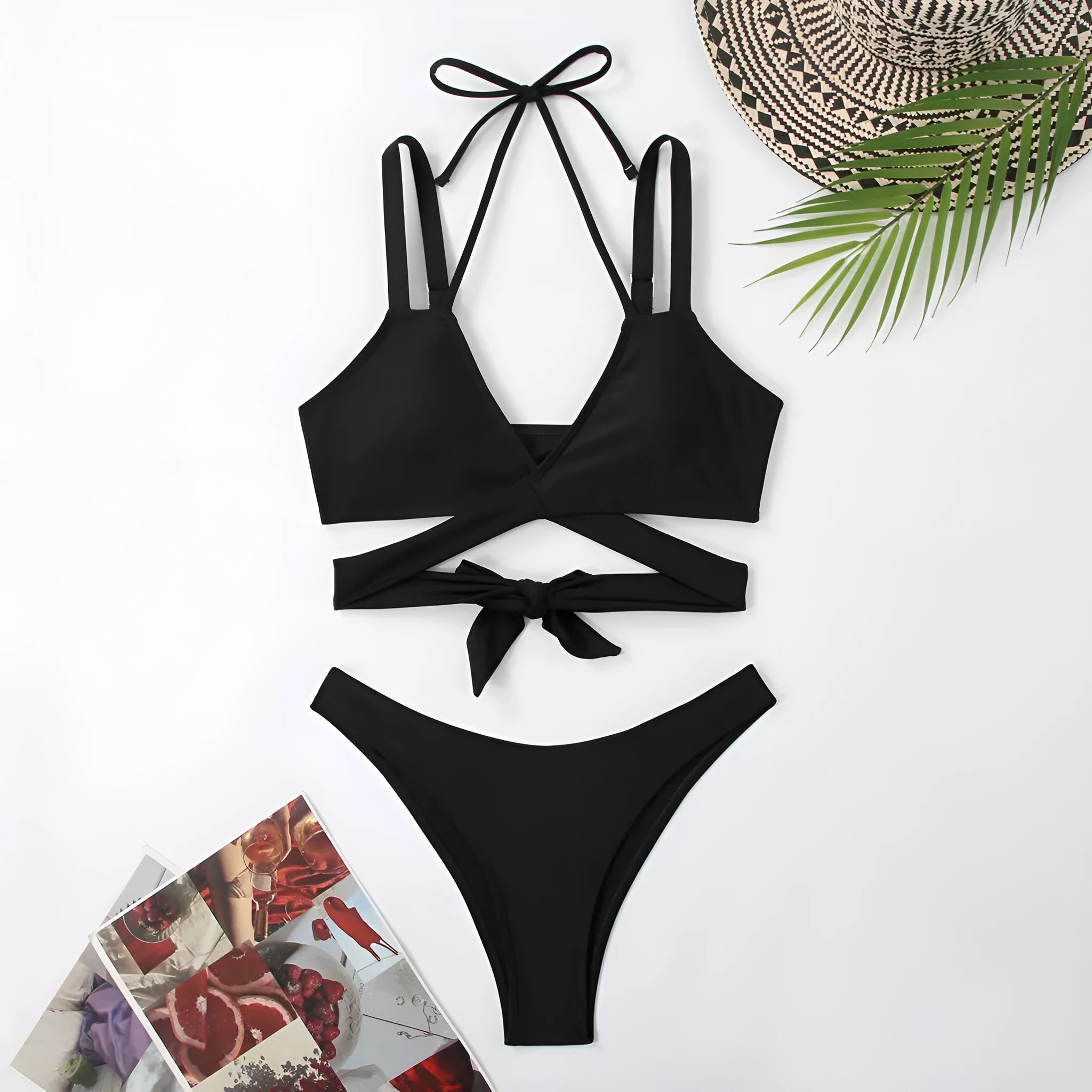 Women's solid colour strap bikini swimsuit in briefs style showing black, blue, red, rose red, and white colour options