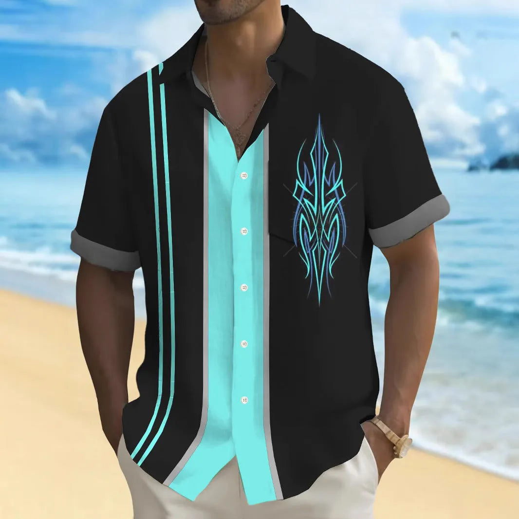 Man wearing a loose-fitting, multicolour printed cardigan-style polyester shirt.