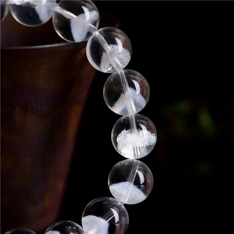 Women's white crystal pyramid bracelet with ruyi charm showing faceted beads in various size options