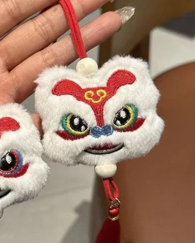 Handmade blue Chinese style plush lion keychain ornament with star stone decoration and tassel