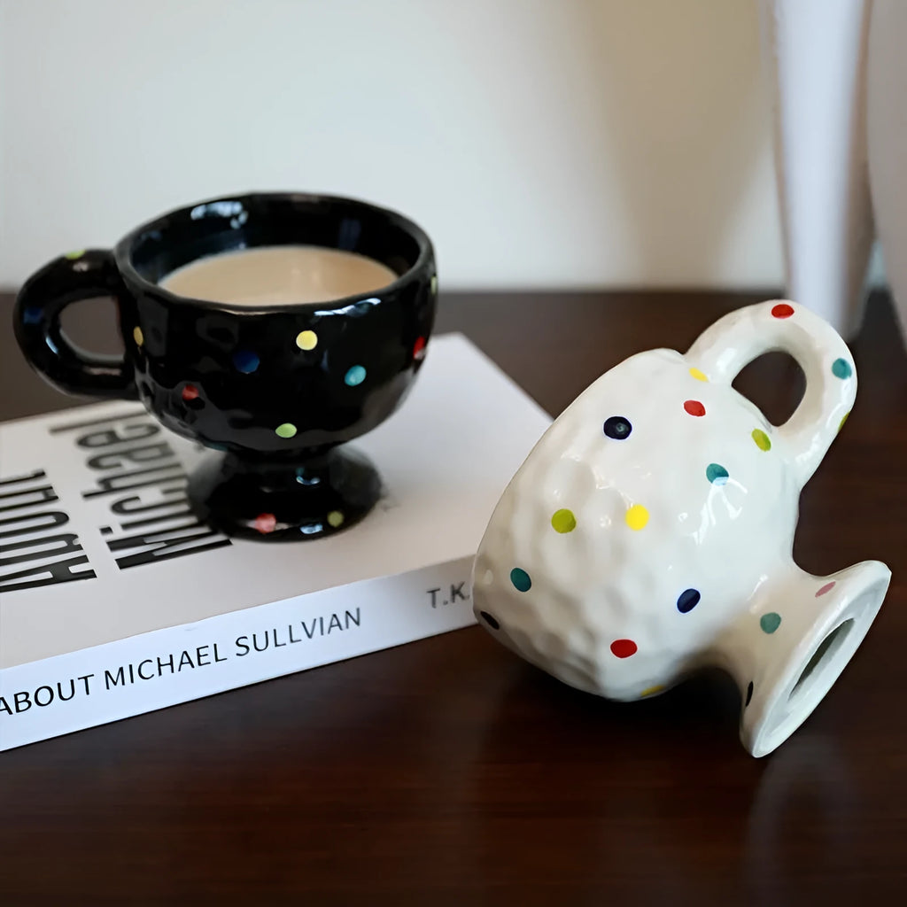 Hand-pinched irregular ceramic mug with modern minimalist design in solid colour