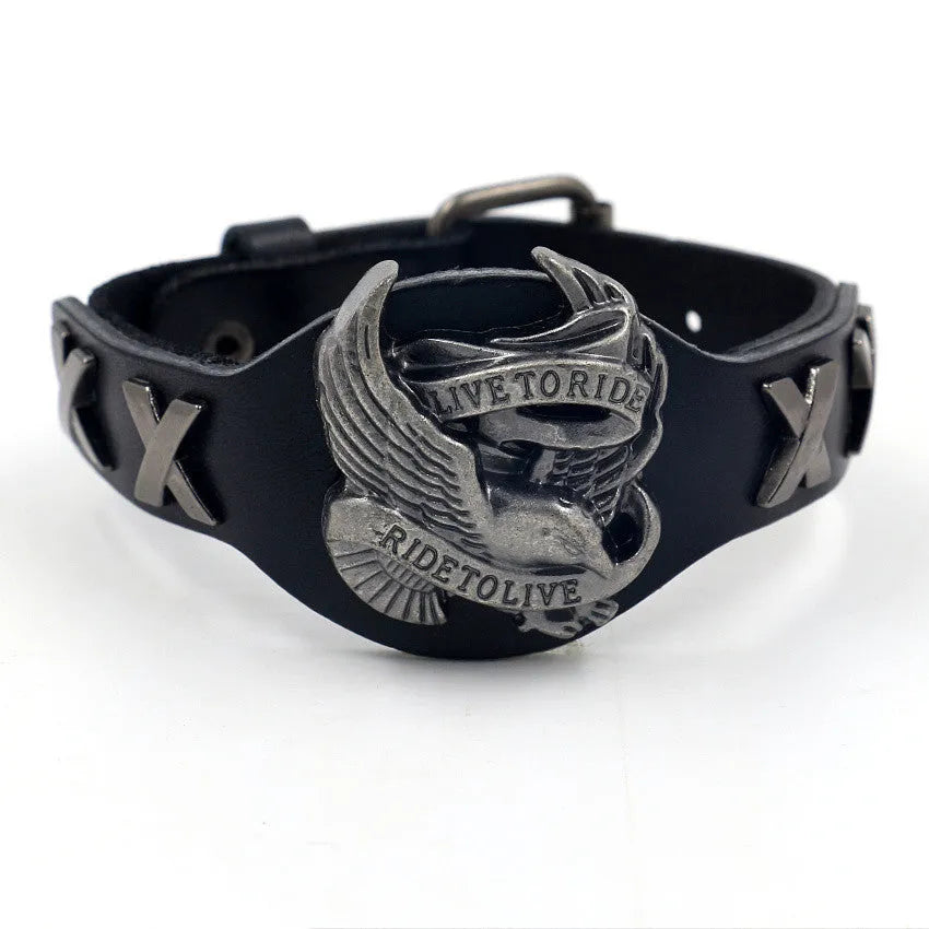 Black geometric leather bracelet with an eagle watch-button, showing tapered width.