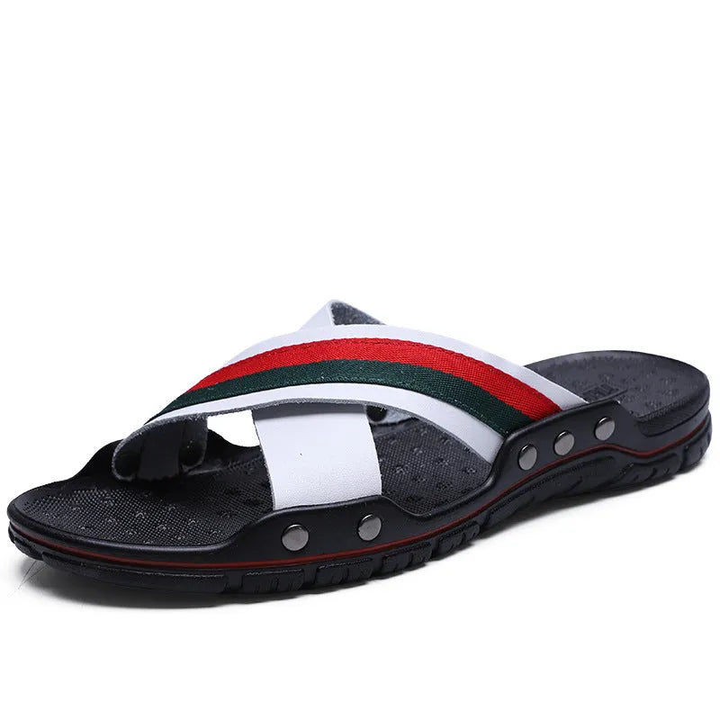 Men's black cowhide leather beach sandals with a non-slip PU sole on a wooden deck.