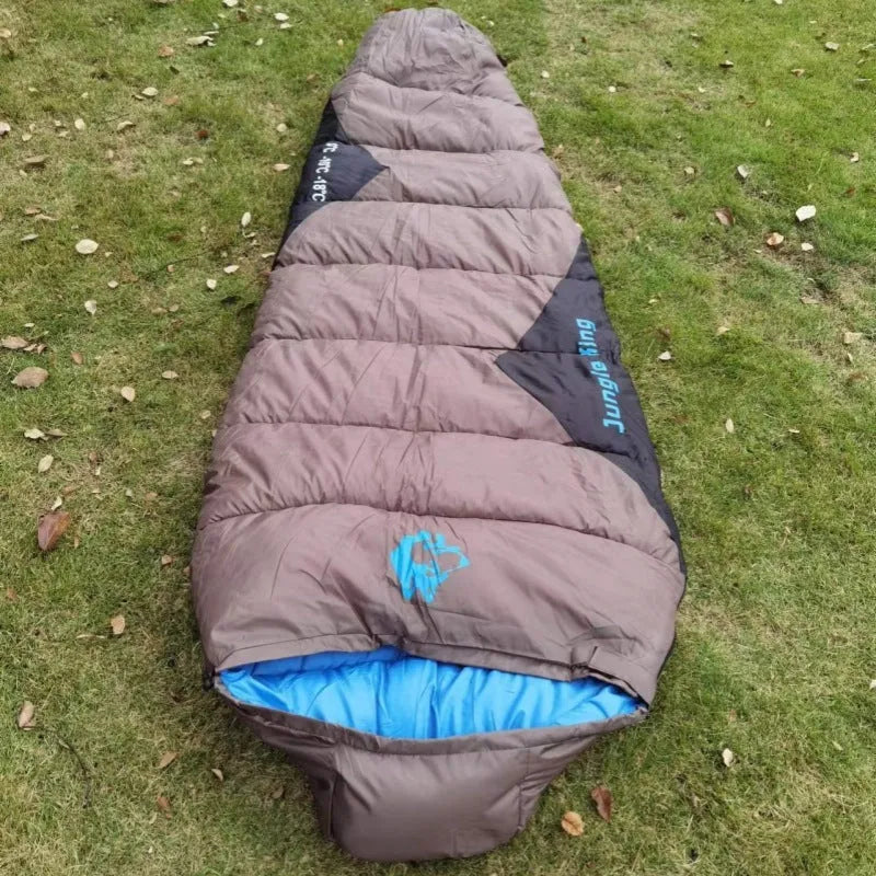 Mummy-style outdoor sleeping bag in Army Green with compression sack, shown with dimensions 230x80x50cm.