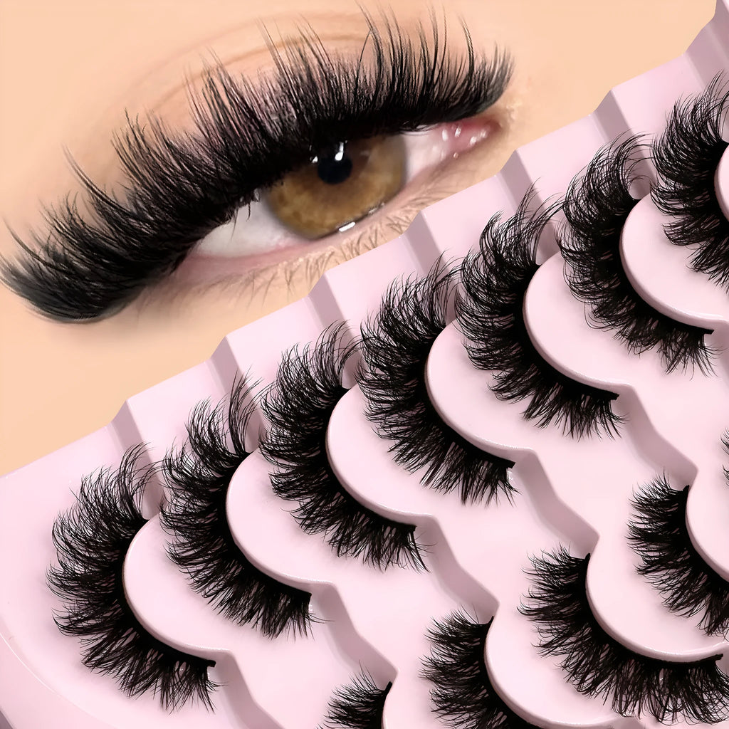 False eyelashes without eyeliner in thick natural long artificial fibre style with adhesive