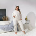 Women's creamy white plush polyester long-sleeve two-piece lounge set with crew neck top and trousers