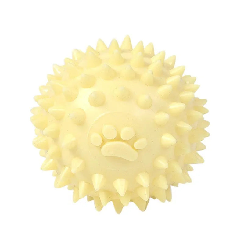 Blue, pink, or yellow TPR dog chewing ball with textured sides for tooth cleaning