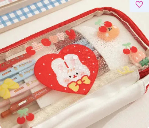 Transparent TPU pen case with heart design and rabbit cake pattern for stationery storage