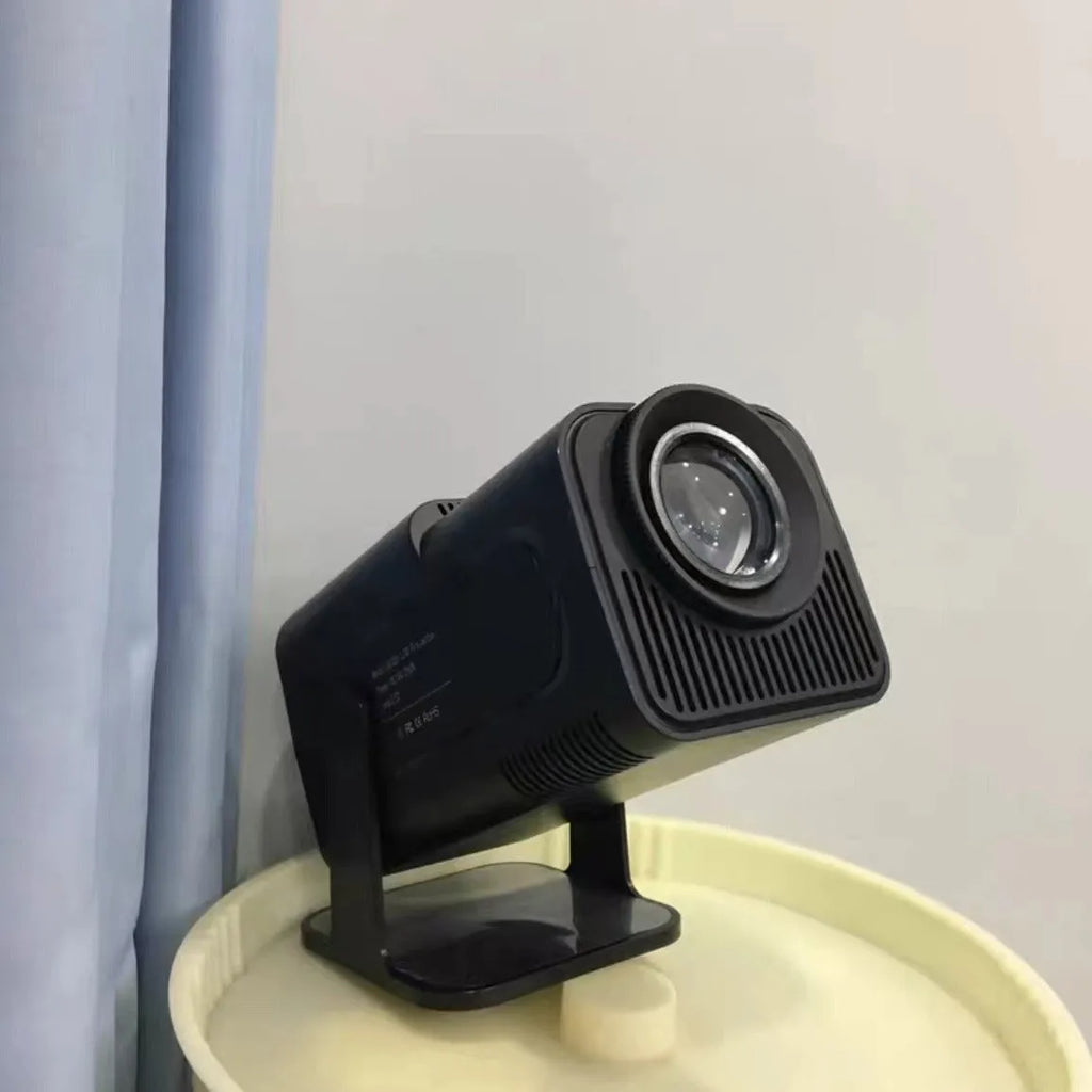 Compact wireless HD game projector with screen handle for home entertainment setup